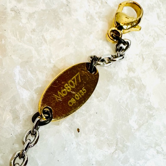 Louis Vuitton Gold & Silver Toned Logomania Bracelet - Picture 14 of 16